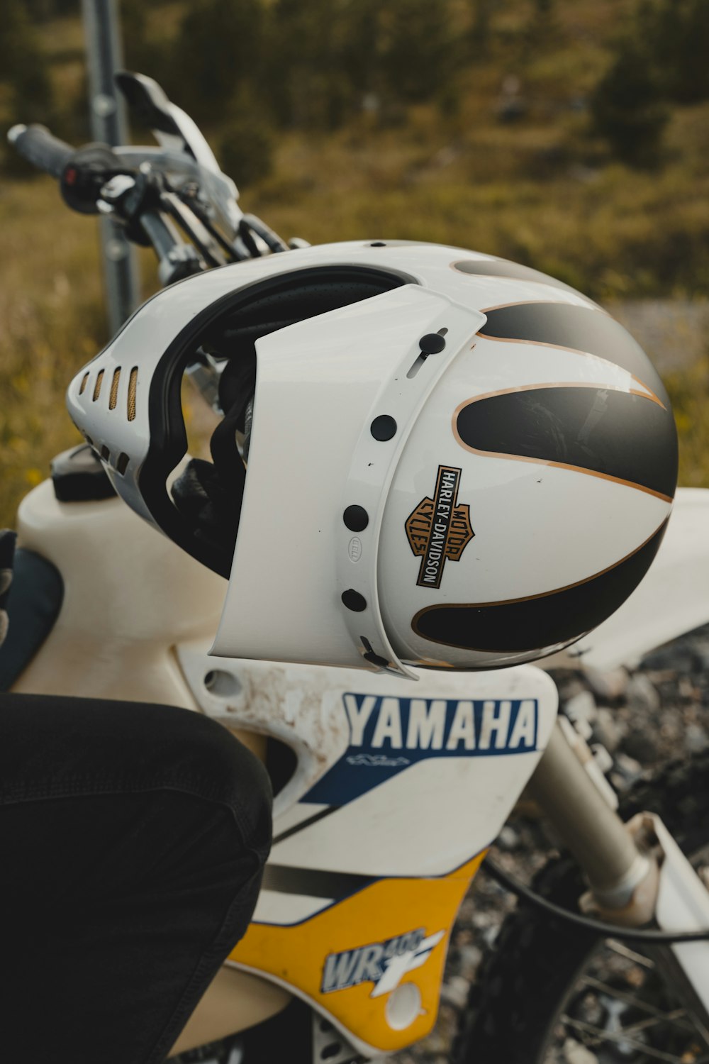 a close up of a motorcycle with a helmet on it