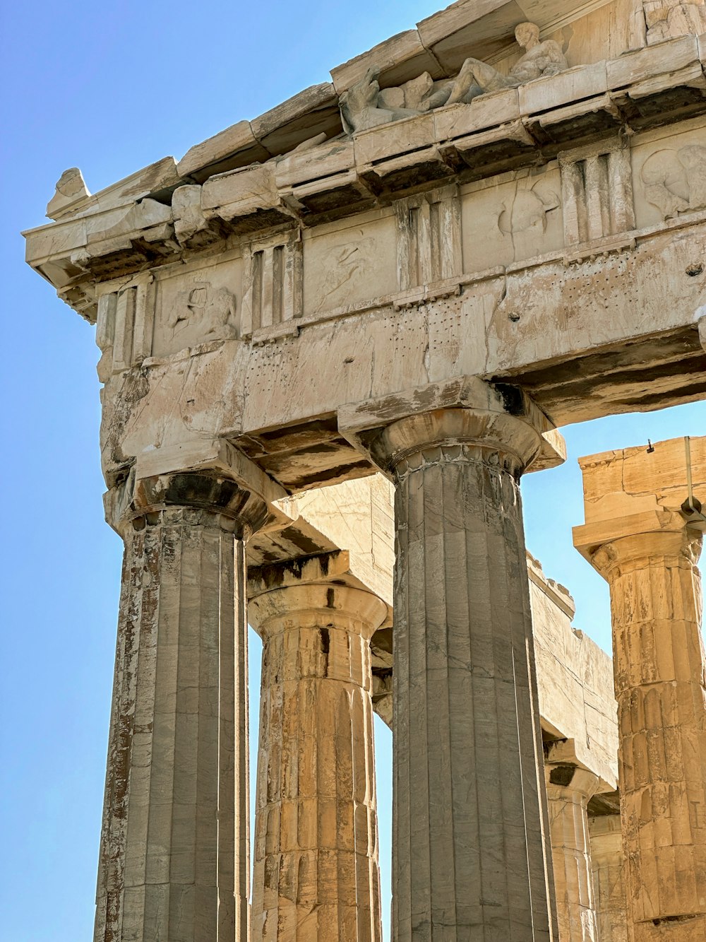 a large stone structure with many columns