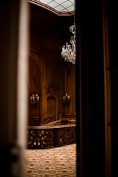 An elegant interior space featuring custom woodwork and stylish lighting.