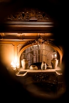 A beautifully decorated room showcasing multiple fire vases creating a cozy ambiance.