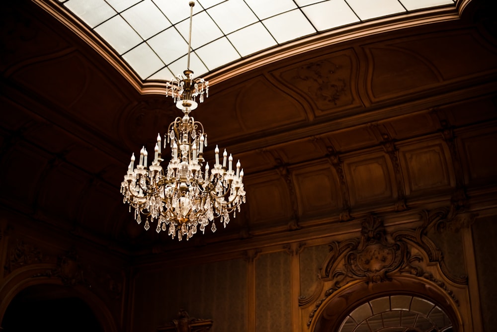 a chandelier hanging from a ceiling in a room