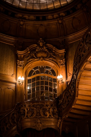 A beautifully restored historic British manor interior showcasing intricate woodwork.