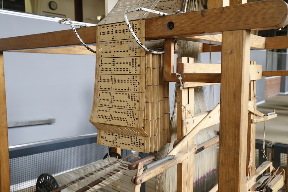 a close up of a weaving machine in a room