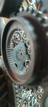 Close-up of interlocking gears overlaid with a digital blueprint of a communication workflow.