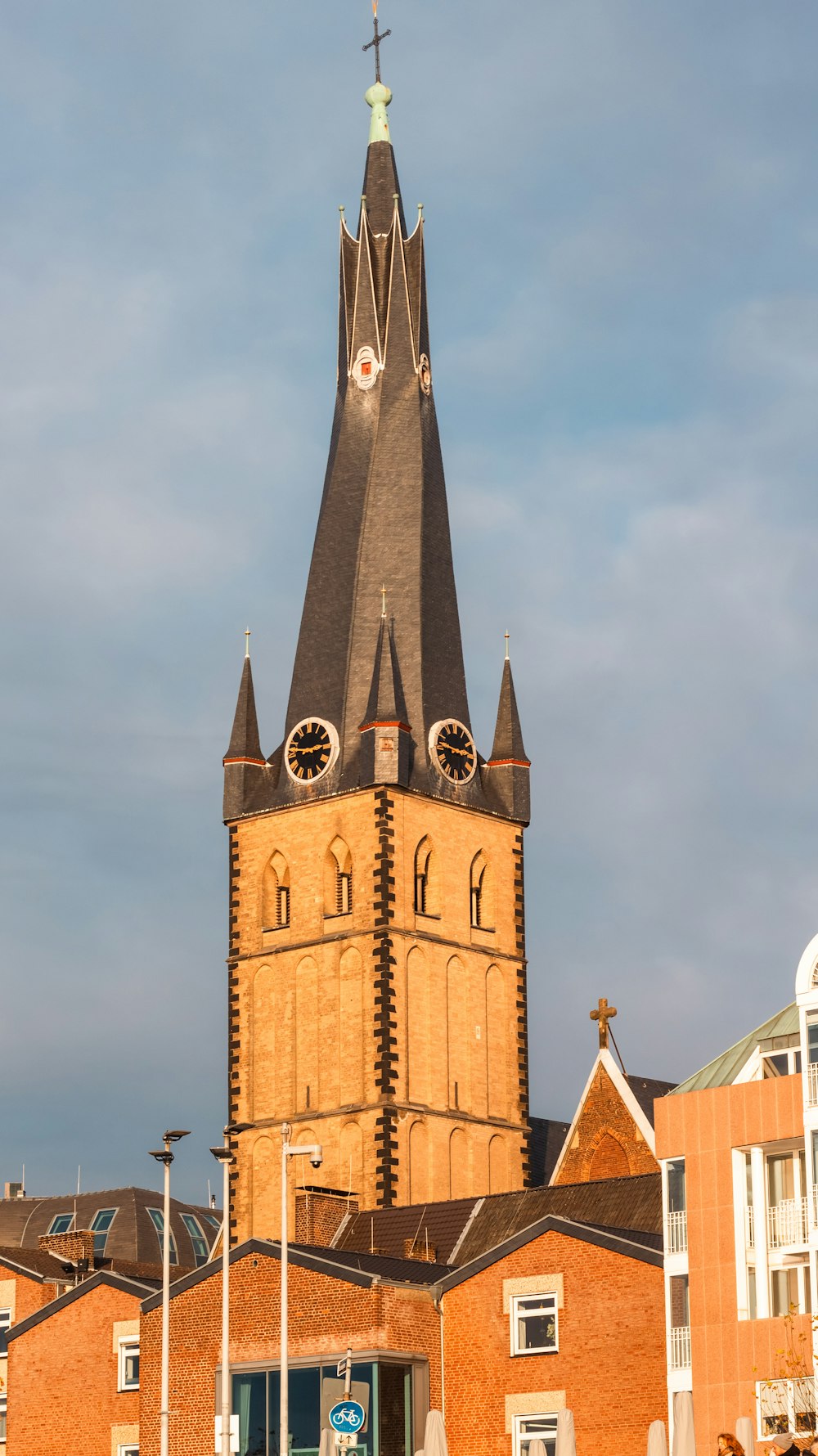 a tall clock tower with a sky background