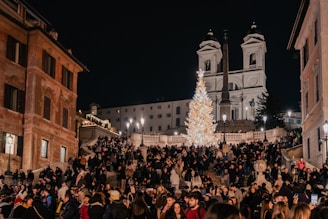 Community members gathered around a Christmas tree lighting ceremony in downtown Hilo.