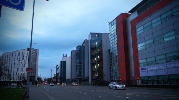 Contemporary commercial office buildings in São José dos Campos with busy street view.