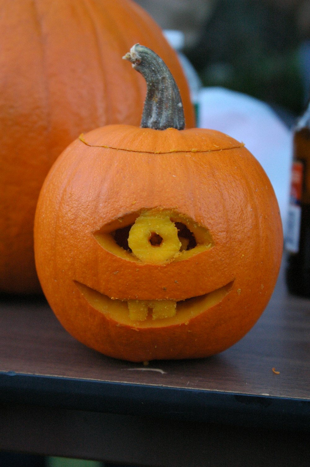 a carved pumpkin with a hole in it