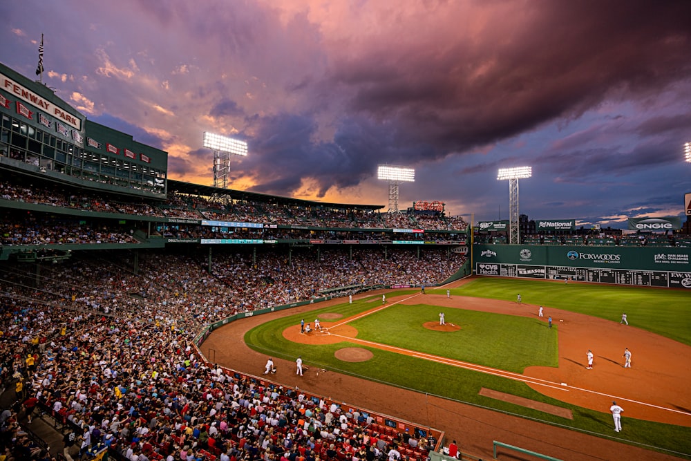 a baseball stadium filled with lots of people