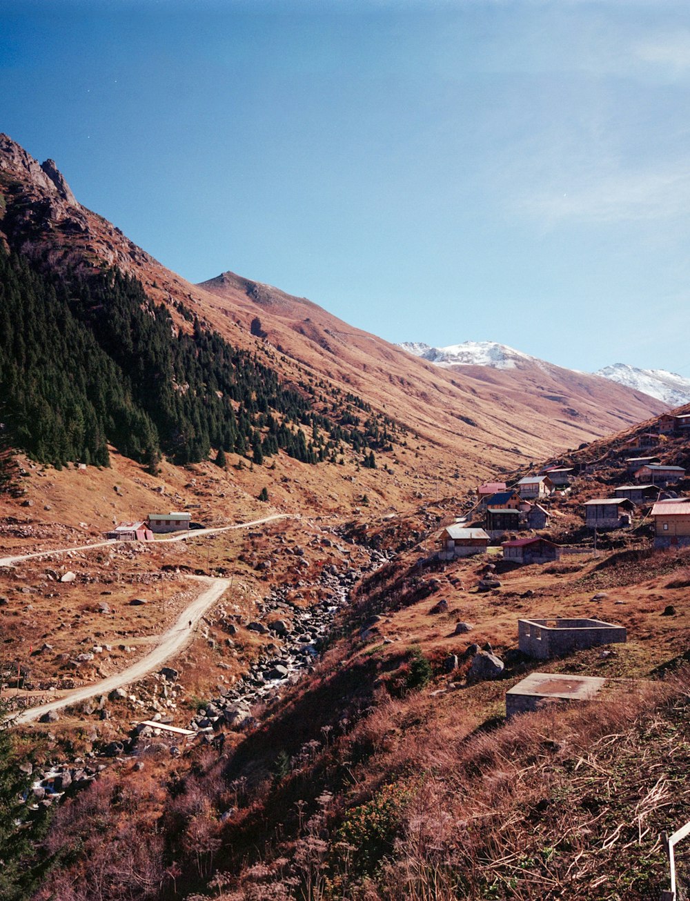 a view of a mountain with a road going through it