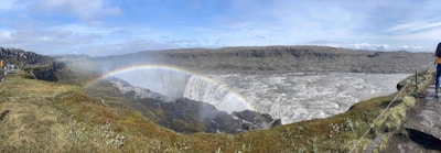 A breathtaking view of Iceland's Golden Circle with waterfalls and lush landscapes.