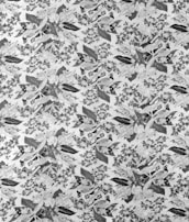 A colorful surface pattern inspired by nature, with playful birds and leaves dancing across the design.