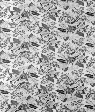 A delicate hand-painted border featuring stars, leaves, and tiny woodland creatures.