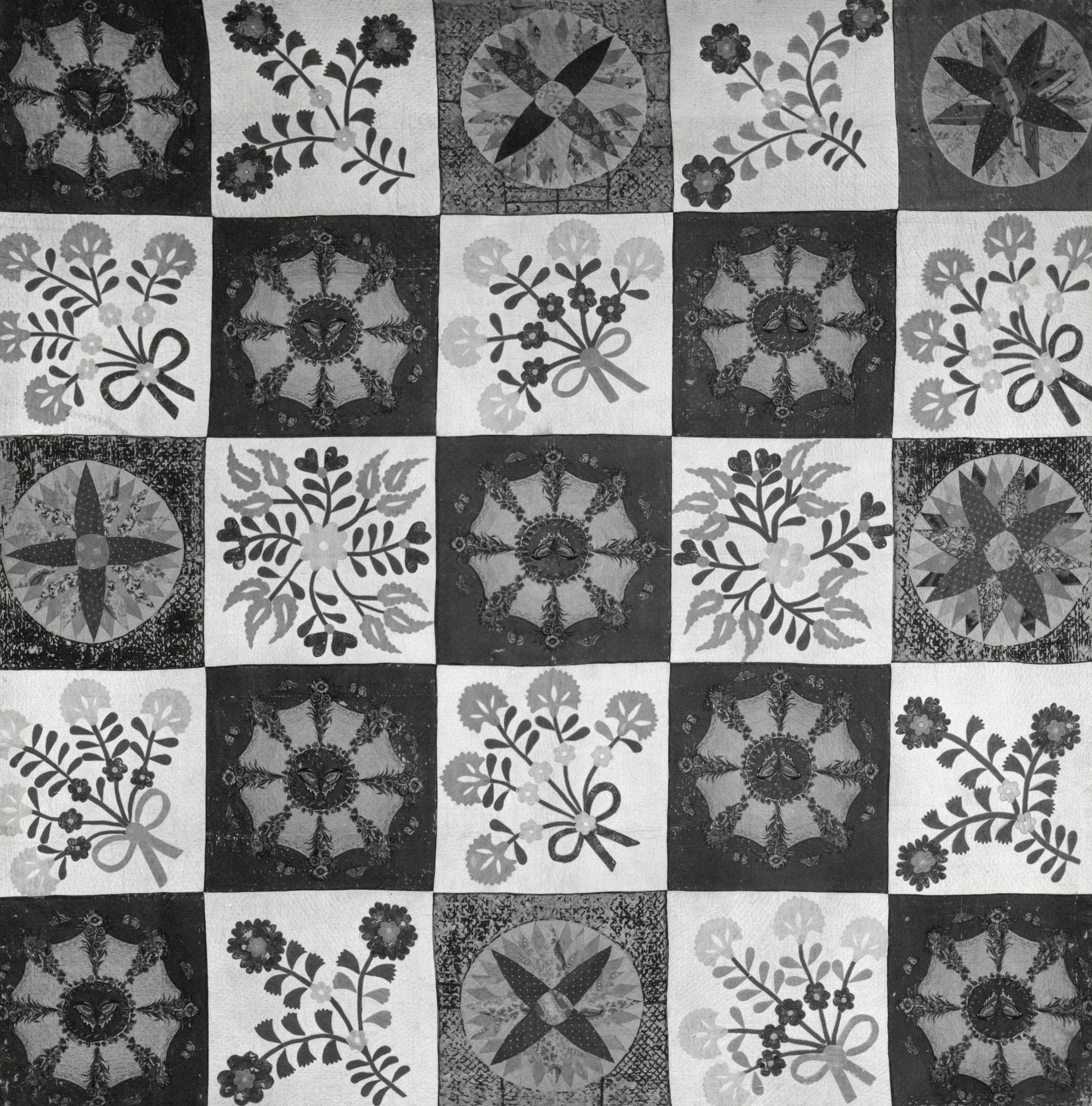 a black and white photo of a quilt