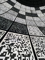 A collection of colorful QR codes on a table.