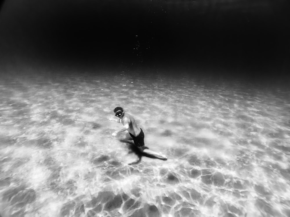 a woman is swimming in the water