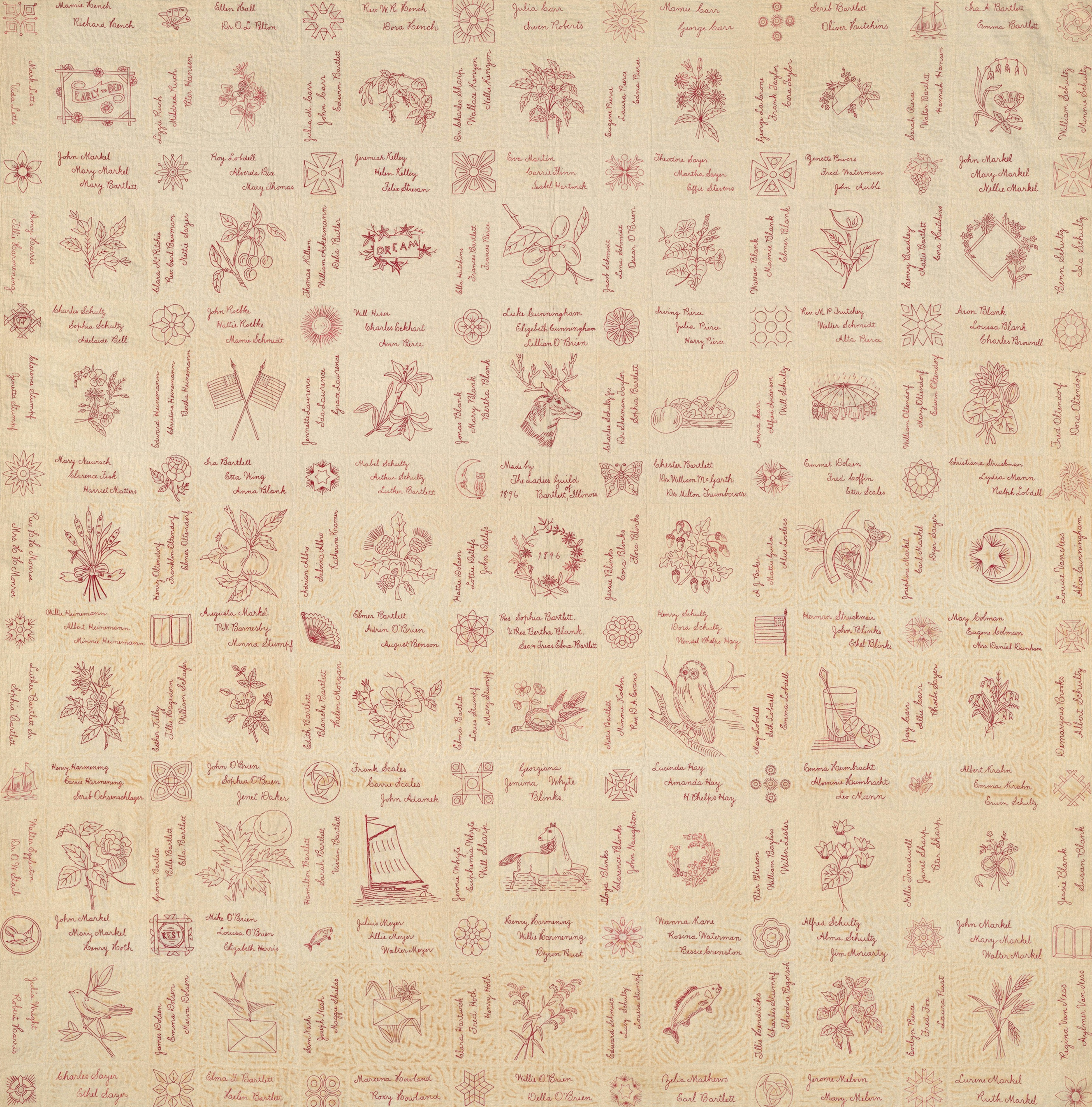 a beige and red rug with a pattern on it