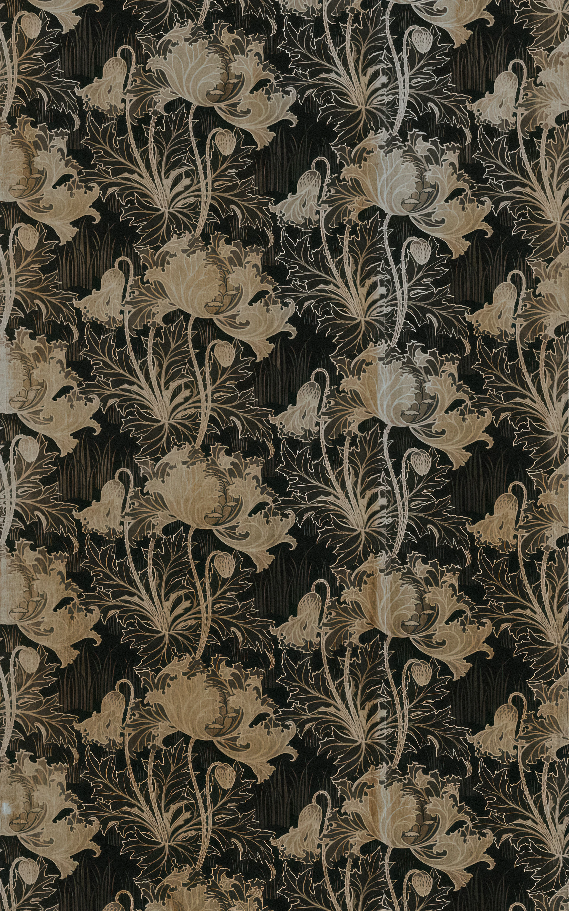 a black and gold wallpaper with flowers and leaves