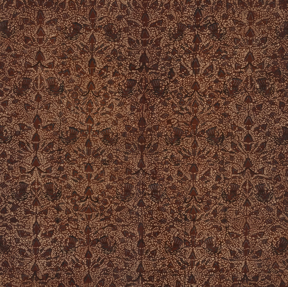 a brown and black pattern on a wall