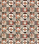 a patchwork quilt with an orange and brown design