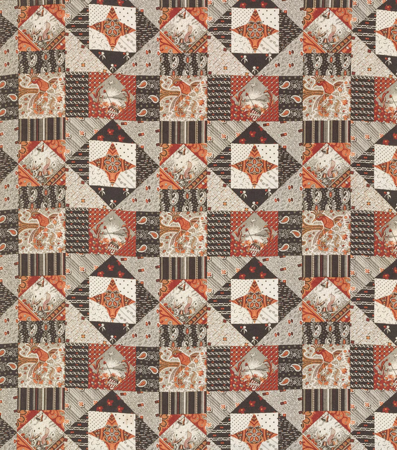 Orange and brown patchwork quilt