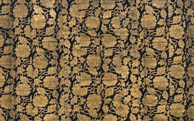 Dark elegant pattern design on fabric showcasing intricate details.