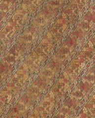 A detailed geometric pattern print with warm earth tones and subtle texture.