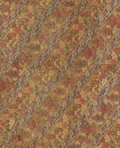 A detailed geometric pattern print with warm earth tones and subtle texture.