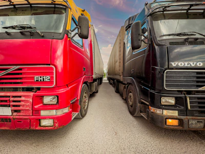 a couple of trucks parked next to each other