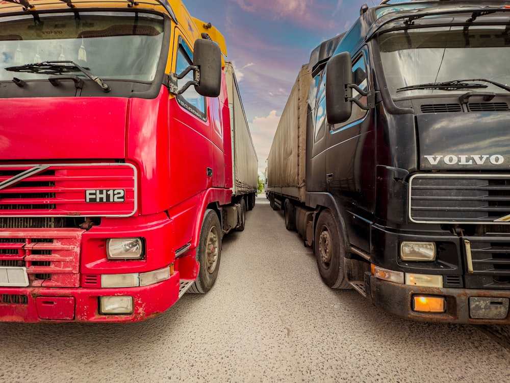 a couple of trucks parked next to each other