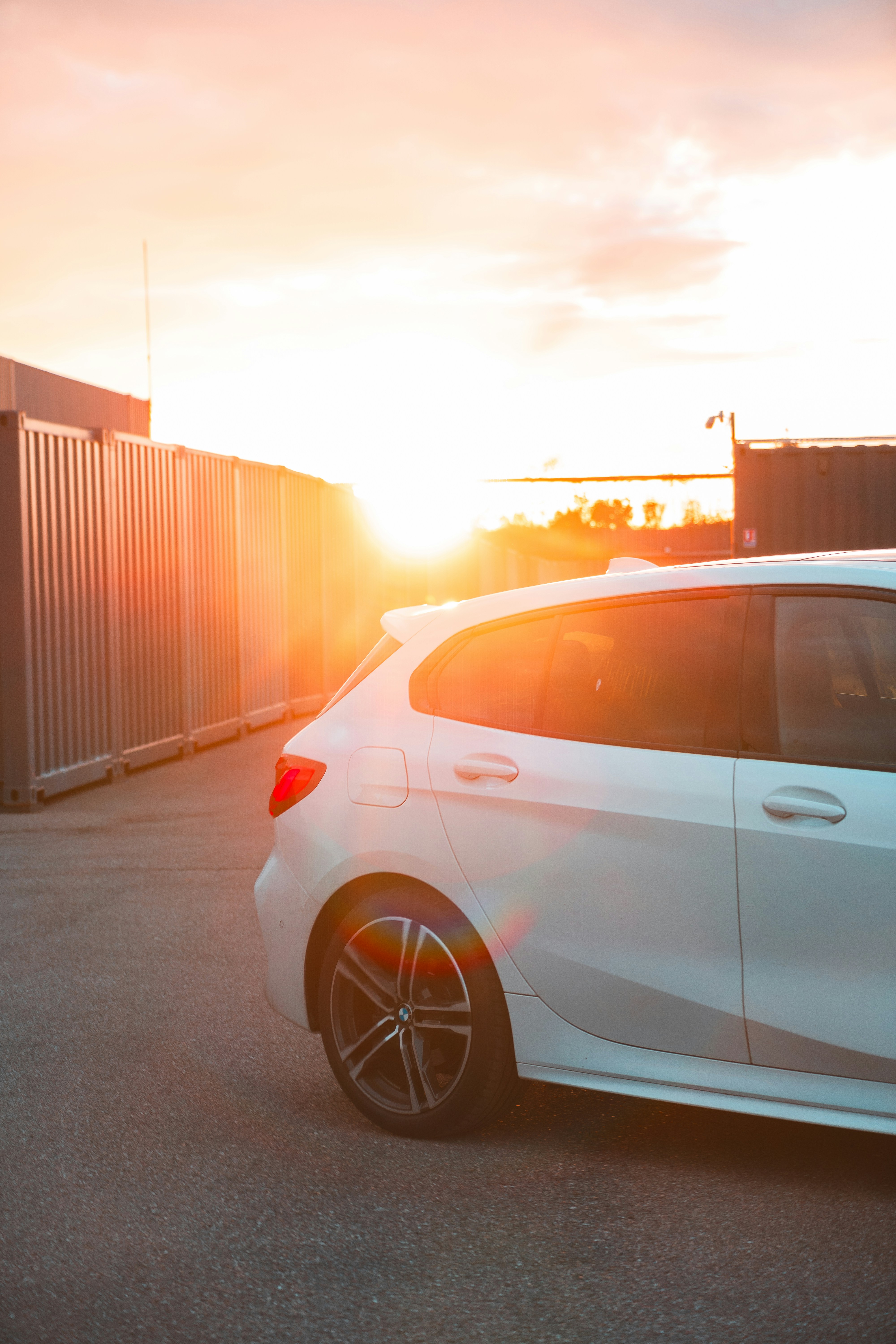 a white car parked in a parking lot