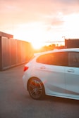 a white car parked in a parking lot