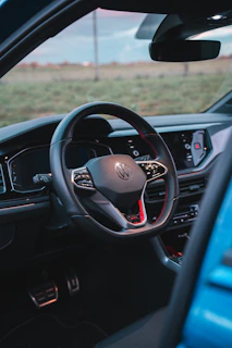 Interior view of a well-maintained used car showing the dashboard and steering wheel
