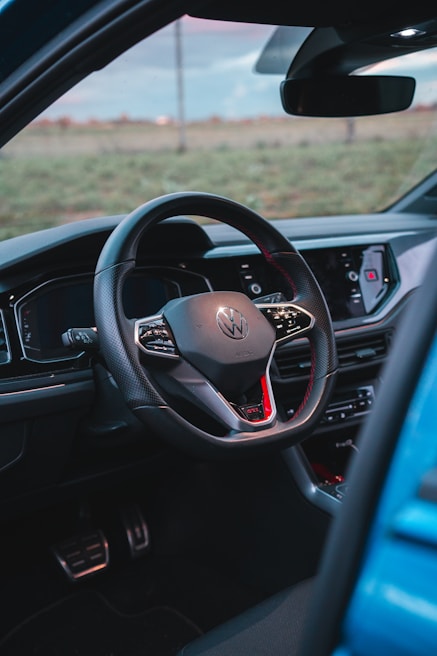 Interior dashboard and steering wheel of a well-maintained second-hand vehicle