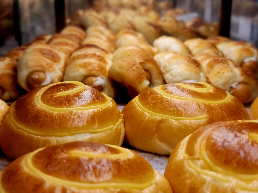 a bunch of breads that are on a table