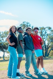 a group of young people standing next to each other