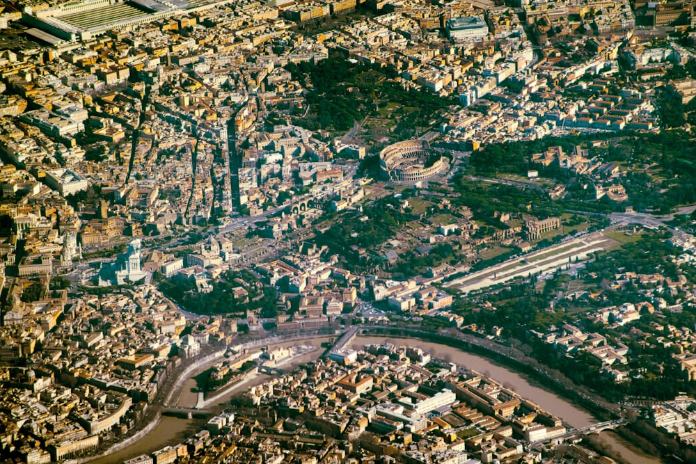 an aerial view of a city with a river running through it