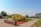 a park with a bench and a walkway