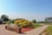 a park with a bench and a walkway