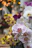 A close-up photo of a vibrant, freshly delivered orchid bouquet in a cozy home setting.