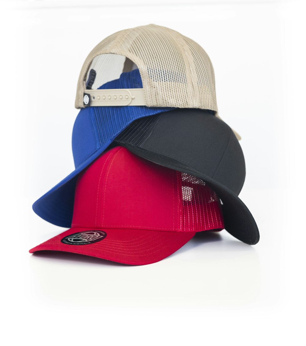 a group of three hats sitting on top of each other