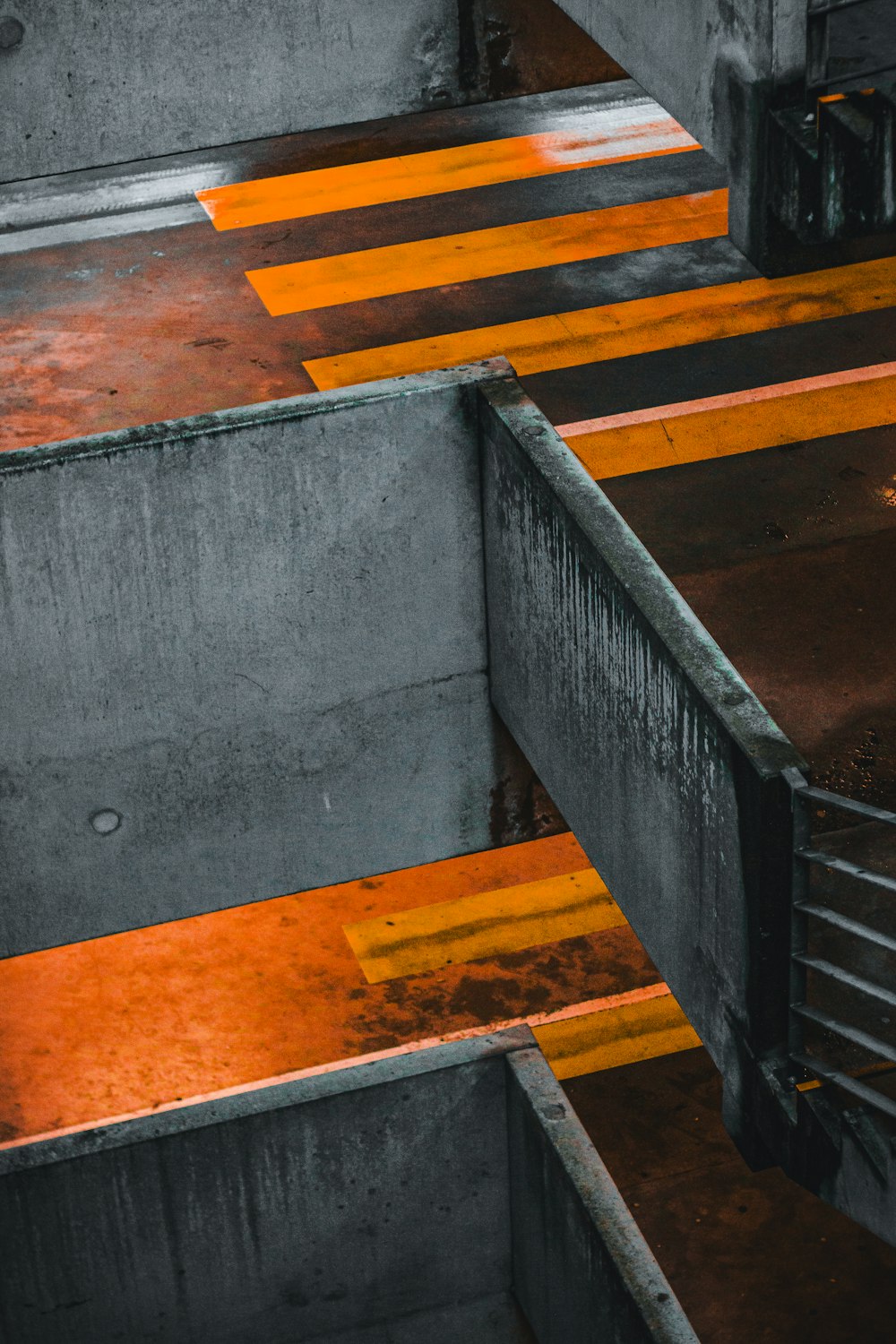 a large metal object with orange stripes on it