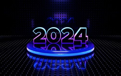 A futuristic setting featuring the glowing number 2024 prominently placed on a circular platform. The digits are illuminated with a blend of blue and purple hues. The background is a dark, perforated wall with a reflective floor that adds to the high-tech, digital aesthetic.