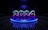 A futuristic setting featuring the glowing number 2024 prominently placed on a circular platform. The digits are illuminated with a blend of blue and purple hues. The background is a dark, perforated wall with a reflective floor that adds to the high-tech, digital aesthetic.
