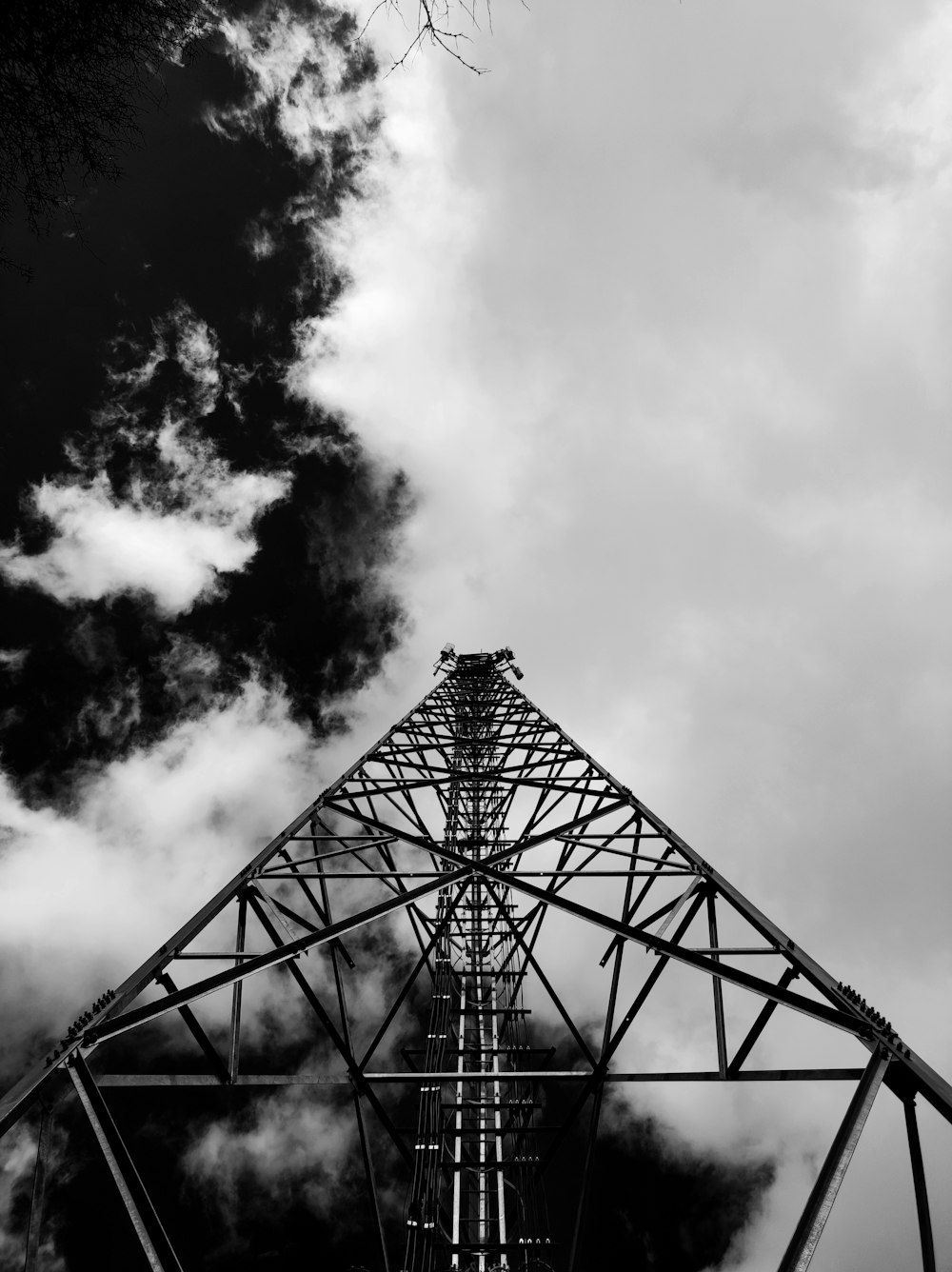 a black and white photo of a power line