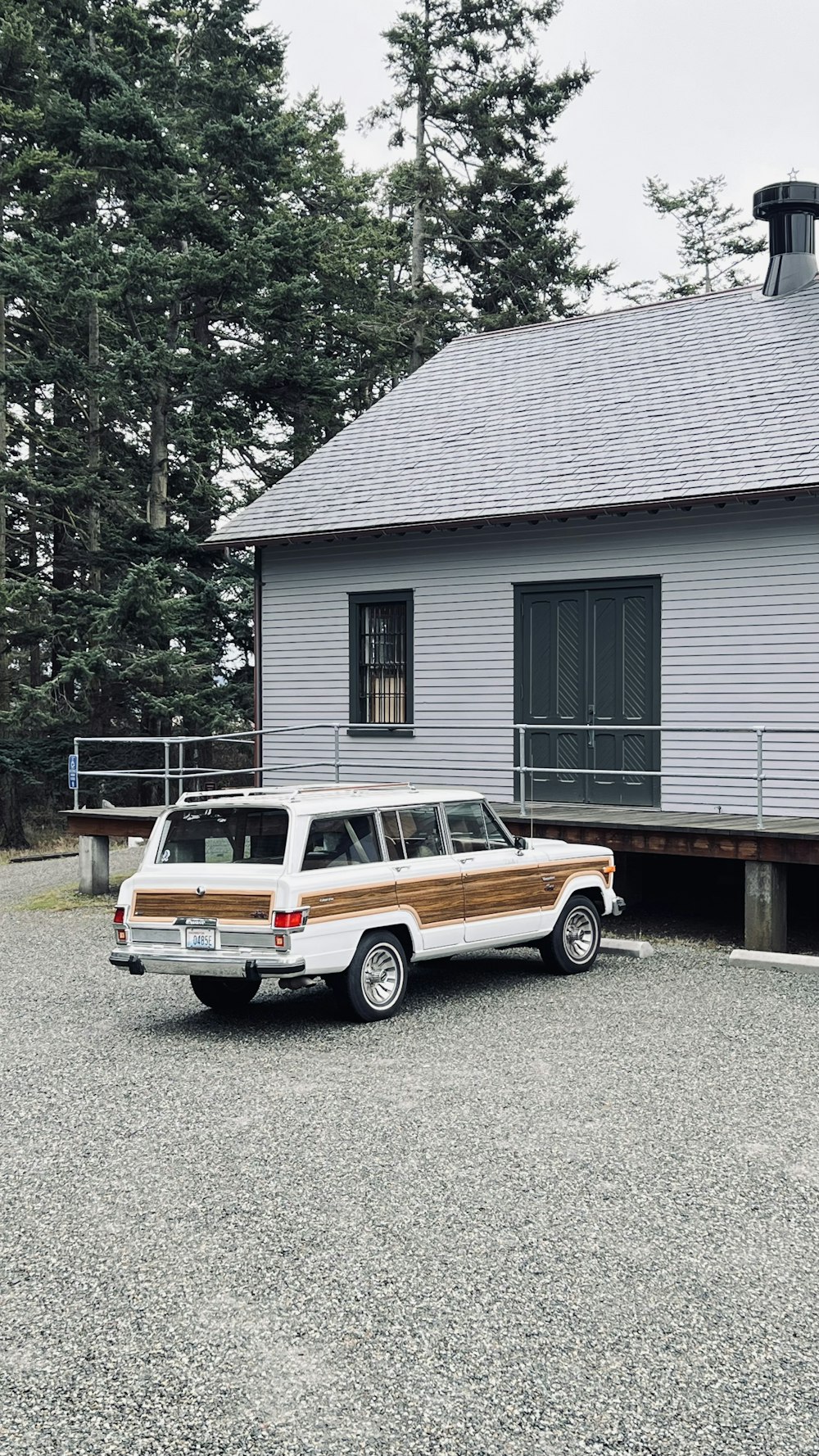 a car is parked in front of a house