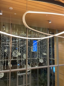 Wide shot of a sophisticated event space with clean lines and subtle decorative elements.