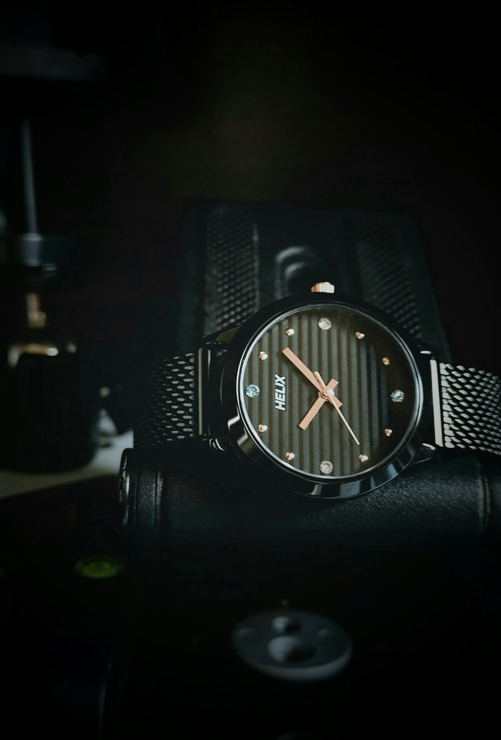 a watch sitting on top of a black case