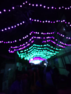 Outdoor LED event setup with colorful lights creating an inviting atmosphere.