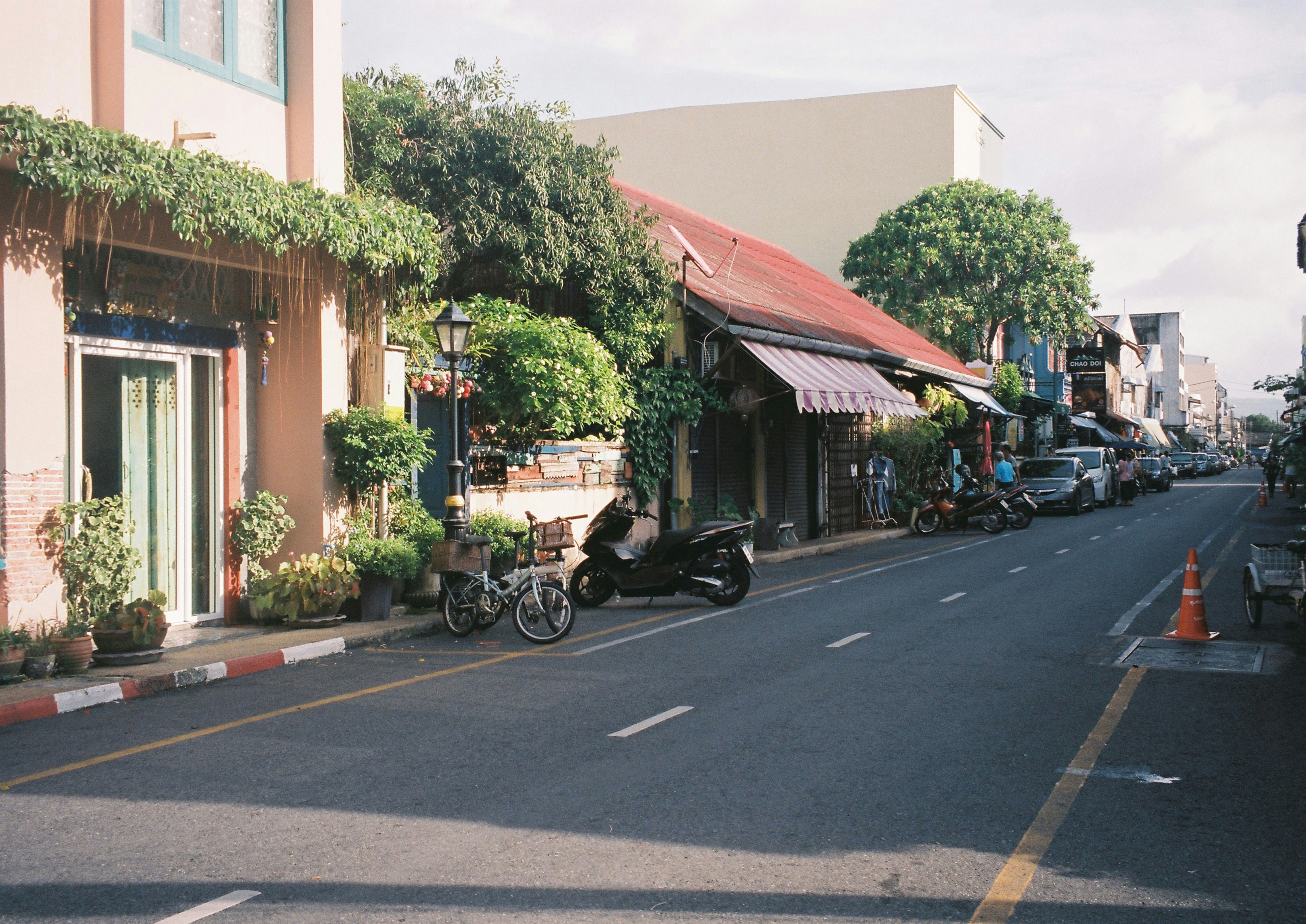 a motorcycle parked on the side of a street